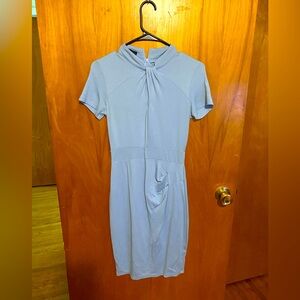 Business casual dress with ruching in the front left of the skirt area